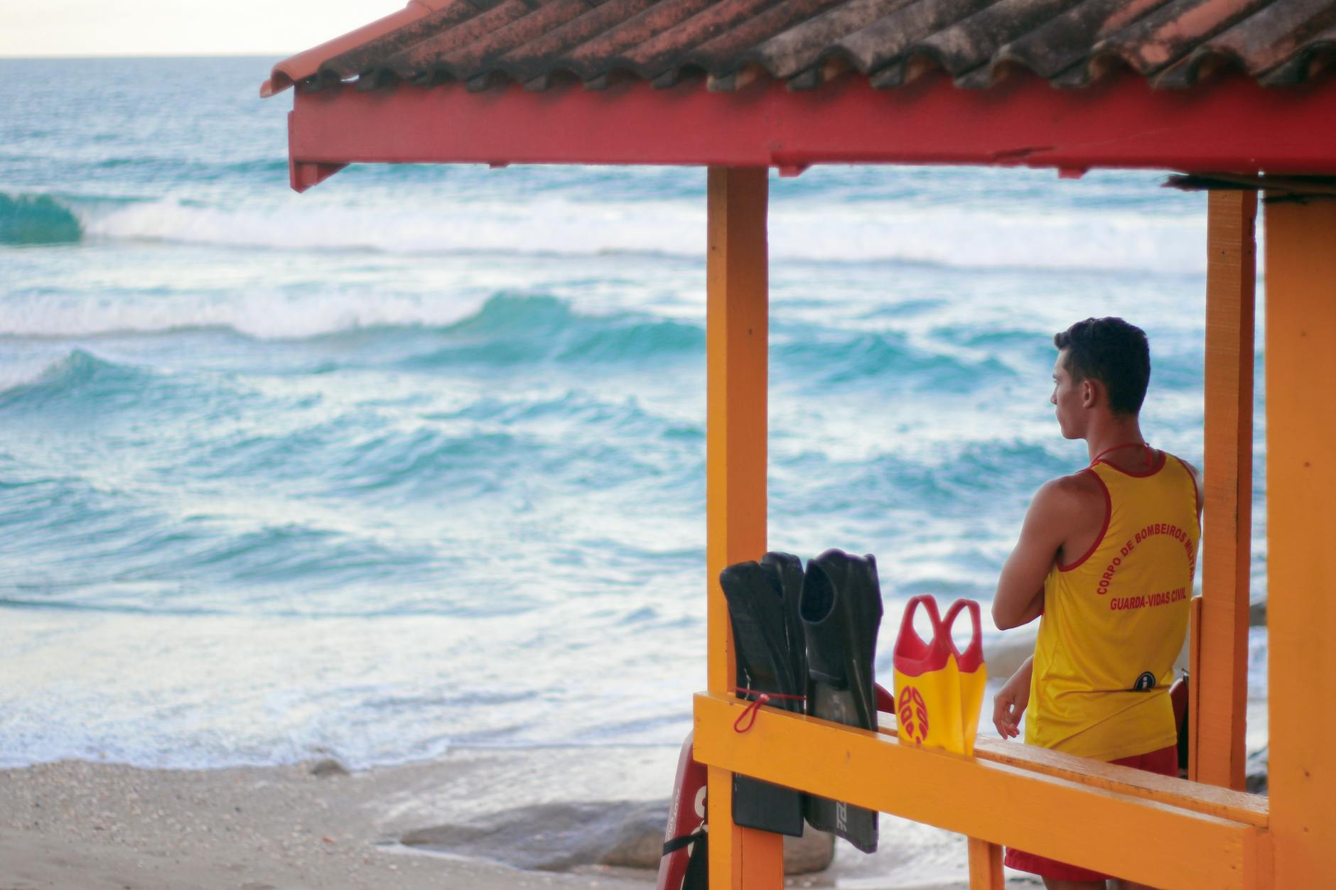 lifeguard standing near beach